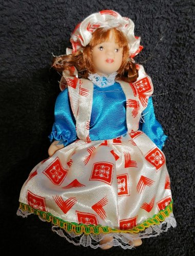 (image for) 6in Porcelain Girl Doll White & Red Print w/ Bonnet