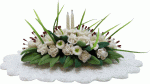 (image for) Holiday Centerpiece on White Oval Doily