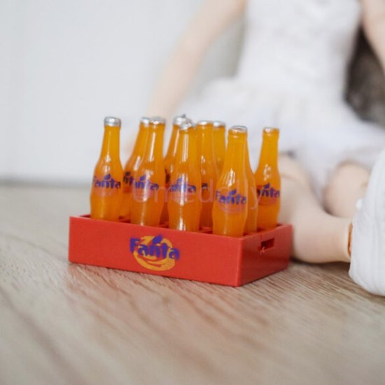 (image for) 12 Miniature Fanta Orange Soda Bottles in a Crate