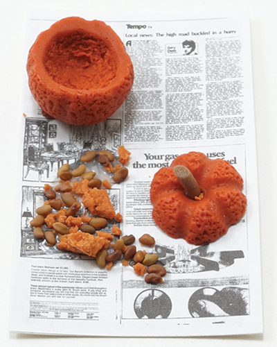 (image for) Carved Pumpkin on Newspaper